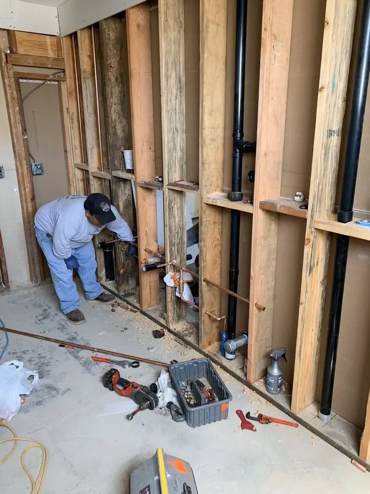 Commercial rough-in plumbing for Water Heater Replacement in Olney Town